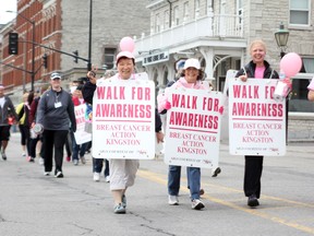 Supporters of Breast Cancer Action Kingston participate in the Walk for Awareness, a part of a fundraising and awareness event held at Confederation Park Saturday. (Danielle Vandenbrink/The Whig-Standard)