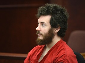 Accused Aurora theatre shooting suspect James Holmes listens at his arraignment in Centennial, Colorado in this file photo taken March 12, 2013. (REUTERS/POOL)
