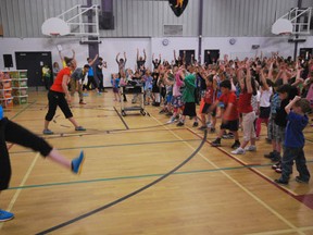 Students are led in some fun physical activity during the launch of Alberta Health's Healthy U program that visited Eldorado and DCS school's last week.