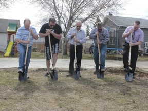 THEODORE STEINER/COLD LAKE SUN
From Left to Right: Harbor View Alliance Church Elders Terry Wilson, Shaun Hartzell, Albert Maheden, Brian Gillette and Pastor Jeff Manwarren turn sod marking the area that will become the Church’s new wing expansion.  The sod was turned on May 12, 2013 and culminates an endeavour of over six years.

For story and more pictures see Page 16 and www.coldlakesun.com
