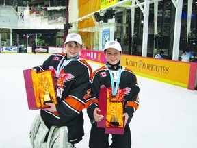 Portage la Prairie’s Riley Sveistrup, left, and Jaytey Towle competed for the GCC Heat under-13 hockey team based out of Qatar. The Heat would win gold, Sveistrup would win most valuable goalie and Towle would win most valuable player. (Sumbitted photo)