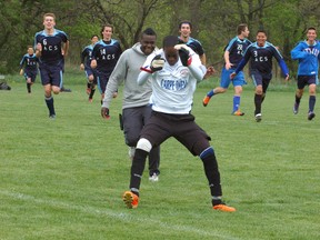 Assumption goalie Theo Campbell celebrates with a dance after his team defeats North Park in a Brant County boys soccer semifinal Monday. (DARRYL G. SMART, The Expositor)