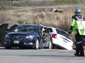 Emergency service personnel responded to a three-vehicle accident on Municipal Road 35 near William Day Construction in this file photo. Two city councillors want to widen the road. JOHN LAPPA/THE SUDBURY STAR