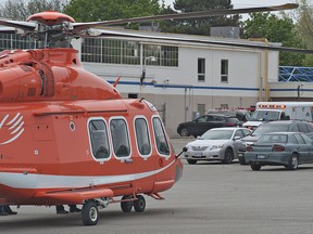 An air ambulance landed in the parking lot at Massilly North America on Elgin Street in Brantford, Ontario late Tuesday morning, May 14, 2013.  The air ambulance left without a patient.
BRIAN THOMPSON/BRANTFORD EXPOSITOR/QMI Agency