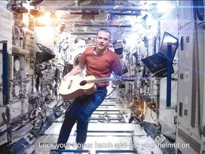 A screen capture of astronaut Chris Hadfield's cover of David Bowie's Space Oddity.