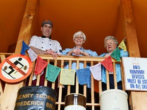 Pictured from left to right are Armen Higgins, cafe owner, Val Porter and Glenna White, both from the Saugeen Memorial Hospital Auxiliary posing for a photo on the upper level of Armen's Cafe on Saturday (May 11, 2013).