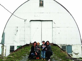 Alix Carr-Harris, Reacher Hylkema, Robin Hulton and Kale Hulton prepare for Wolfe Island’s second annual Barn Pong. The table tennis tournament and fundraising barbecue in support of The Early Years Centre takes place Saturday, May 18.