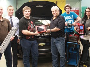 Shop students at Roland Michener Secondary School now have the tools to take their trades education one step further thanks to Goldcorp. The donation will go towards new technology and equipment in the shop and wood working classrooms, enabling the school to increase interest in skilled trades. From left are Darrin Reade, John Sullivan, Devin Haapakoski, Domenic Rizzuto, Brandon Meunier, Cheyanne Kinch and Patricia Batteneau.