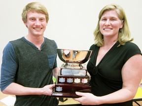 MONTE SONNENBERG Times-Reformer
Swimmer Daniel Reardon of Normandale receives the Janet King Memomiral trophy from his coach Lisa Anderson. The award was handed out at the Norfolk Hammerheads' annual awards banquet last Friday.
