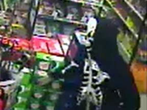 Kingston Police are looking for a man who tried to rob a convenience store in the Portsmouth Village area Sunday night while wearing a hoodie with a skeleton print on it.