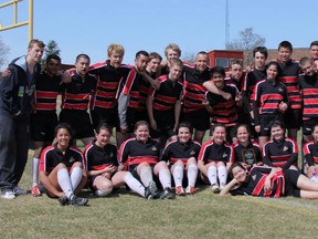 Both men’s and women’s Trappers rugby team pose for a photo at their tournament in Cold Lake this past weekend. Madonna MacIsaac/supplied photo