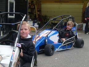 Dawson Wilson (front) and his older brother, Chase (back) will be behind the wheel of quarter-midget cars this season.