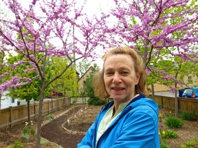 Jacqueline Thompson, executive director of LifeSpin on Dundas St., stands in their little park on Ontario St. Thompson said the $200 exemption could have a big impact, especially for singles who get $606 in monthly assistance. (MIKE HENSEN The London Free Press)
