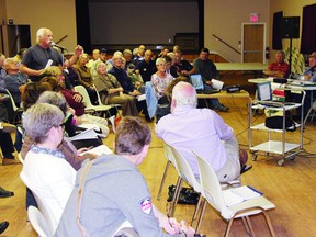 Allumette Island residents ask questions concerning a possible amalgamation of Pontiac County municipalities during a public information meeting Tuesday night in Chapeau. Municipal leaders said at least $500,000 could be saved from a merger.