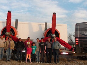 Submitted by Doug  Roy 
Members of the Fairview Aircraft Restoration Society (FARS) stand by the trailer transporting two display-only engines from a Canso aircraft to Newfoundland where they will be exchanged tor two running, low-hour engines, thanks to the generosity of the communities of St. Anthony and Stephenville. Also being transported is a wing which will be exchanged with a group that has a metal covered wing and wants a fabric covered one- which FARS happens to have. The metal covered wing will be more durable and need less maintenance. The crew left Fairview May 3 and Internet tracking showed they had reached Newfoundland Sunday