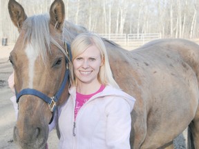 Logan Clow/R-G
Local barrel racer Rosalyn Harpe with her horse  ìCougarî that she will be competing with this year. The Record-Gazette sat down with Harpe to learn more about the sport of barrel racing.