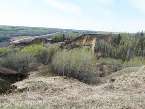 A landslide along the edges of the Hines Creek coulee took out power lines to Highland Park, leaving residents in the dark for some time. Highway 682 can be seen in the distance to the left.