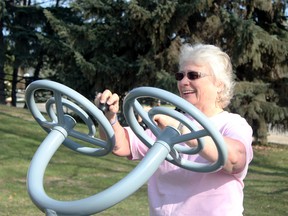 Karen Singer added using the outdoor exercise equipment to her exercise routine as part of the Community Wellness Challenge