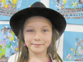 MaryJane Wagner, a kindergarten student, added a hat to her ensemble for the day.