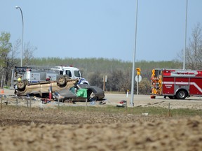 A row of five crosses rest feet away from another fatal collision at the Highway 43 and Township Road 733 intersection, outside of Bezanson on Wednesday, May 8, 2013. Since 2002, there have been 11 fatalities at that intersection. (Aaron Hinks/daily Herald-Tribune)