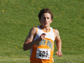 North Park Collegiate runner Austin Solak captures the open boys steeplechase event Wednesday. (DARRYL G. SMART, The Expositor)