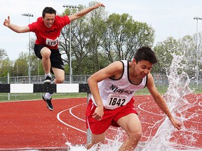 The open boys steeplechase was part of the slate of events at the Bay of Quinte track and field championships Wednesday at MAS Park. (Bruce Bell/The Intelligencer)