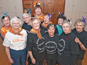 Members of the Grand River Grannies (front row, from left) Janice Doty, Elizabeth Banks, Sandra Shaw, Dawn McClelland and Woody Sherman, and (back row, from left) Jennifer de Alwis, Susan Butcher, Dianne Iverson, Millie Valian and Carol Salmon sport their fascinators. (Brian Thompson, The Expositor)