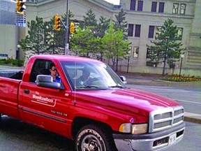 Submitted photo
Investigators hope a member of the public can identify the men (pictured) in this truck which was reported stolen from Ottawa two days before the Northern Credit Union in Eganville was robbed. The truck was found abandon in a field at Serenity Bay Campground on Sunday.