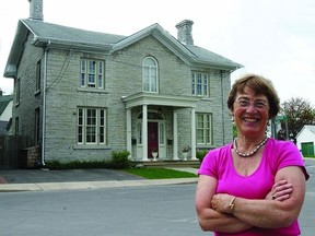 Marion Westenberg, committee chair of the Music Lovers’ House Tour, stands before a century-old home at 66 Main St. The historical home is one of several stops included in this year’s tour presented by the volunteer committee of the Kingston Symphony.        ROB MOOY - KINGSTON THIS WEEK