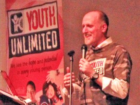 Dan Walker, a youth worker with Youth for Christ/Youth Unlimited, takes to the stage at the annual Youth Unlimited Fundraiser Banquet May 4.