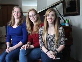 Three Timmins teens have achieved one of the highest choral honours possible as they prepare to join the Ontario Youth Choir. Kristiina Frechette, from left, Rebecca Lord-Rainville and Madison McIvor-Kirkpatrick will be joining the prestigious chorus later this year.