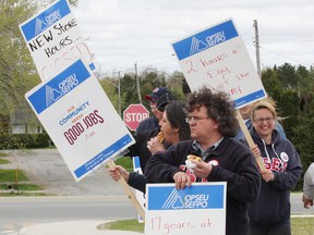 Unionized LCBO workers and their supporters held an information picket and solidarity barbecue at the LCBO on Long Lake Road in Sudbury, ON. on Thursday, May 16, 2013. See video at www.thesudburystar.com JOHN LAPPA/THE SUDBURY STAR/QMI AGENCY