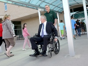 TRENTON, ON (05/17/2013) Students and staff from St. Peter Catholic School wonder why Quinte West Mayor John Williams is in a wheelchair, Friday, May 17, 2013, as he takes part in a preview for the Quinte Access Access-a-Thon to be held on June 1. 
EMILY MOUNTNEY QMI AGENCY