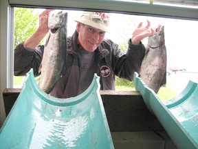 Fish Kincardine Derby angler Ken McClement shows off his catch before weighing it in May 17, 2013.