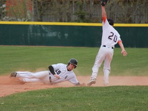 Jacob Melville sliding in safe to second base. The Oil Giants put up a fight -- managing to tie things back up in the top of the sixth inning -- despite the White Sox three-run lead at the bottom of the fourth. Melville was on base when Chance Wheatley won the game with his deep right field drive. - York Underwood, Reporter/Examiner