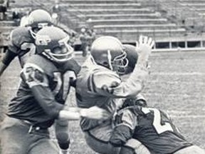 Gerry Blacker, seen here getting tackled in 1972, was a star both as a teenager and during his time at Waterloo-Lutheran, now known as Wilfrid Laurier University. Blacker passed away at the age of 63 after battling prostate cancer.