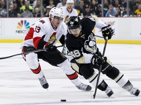Ottawa Senators Jakob Silfverberg pursues Pittsburgh Penguins Tyler Kennedy during NHL Eastern Conference Semifinal playoff hockey action at the Consol Energy Center in Pittsburgh, Pennsylvania on Friday May 17 ,2013. Errol McGihon/Ottawa Sun/QMI Agency