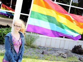 Sapphire Fishback, 15, of the Gay Straight Alliance at John McGregor Secondary School shows her school's pride colours. A rainbow flag was raised Friday at JMSS in celebration of International Anti-Homophobia Day. KIRK DICKINSON/FOR CHATHAM DAILY NEWS/ QMI AGENCY