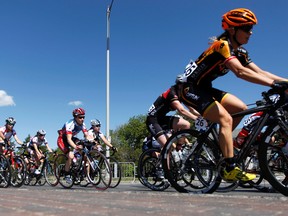 Professional female cyclists race along Boul. des Allumettieres during the Grand Prix Cycliste de Gatineau, Saturday. Darren Brown/Ottawa Sun