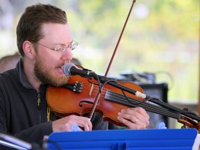 Arlen Wiebe performs during the World Fiddle Day event held at the Queen's Park bandstand in Owen Sound  on Saturday, May 18, 2013. (JAMES MASTERS/QMI Agency/The Sun Times)