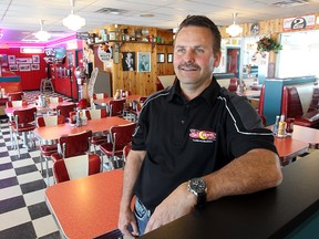 Wayne McIntosh, owner of the Half Moon Drive In in Lockport, Man., stands in his restaurant Monday April 15, 2013. The restaurant will celebrate its 75th anniversary in July. (BRIAN DONOGH/WINNIPEG SUN/QMI AGENCY)