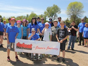 SEAN CHASE    Friends, family and community supporters came out Saturday for the inaugural Colby's Crusade for Jesse's Journey Walk-a-thon at Riverside Park. Here event organizer, Gloria Audette (centre) joins her son, Colby (second from left) on the walk. Colby has Duchenne Muscular Dystrophy (DMD), a genetic disorder that gradually weakens the body’s muscles.