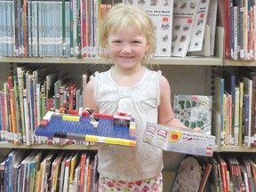 A winners in the Mayerthorpe Public Library Lego Contest shows her prize-winning creation on awards day Wednesday, May 10. She is Rayna Harris, winner in the ages four to six category with A House. Her prize? More lego.