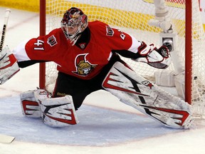 Ottawa Senators' goalie Craig Anderson (41) makes a save against the Pittsburgh Penguins during the first period of NHL hockey action in game three of the Stanley Cup Playoffs second round at Scotiabank Place Sunday, May 19, 2013.  Darren Brown/Ottawa Sun/QMI Agency