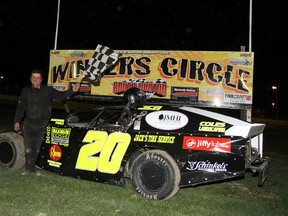 Jeff Daniels celebrates his UMP Modified feature win Saturday at South Buxton Raceway. (Contributed Photo)