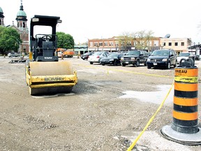 The downtown property owned by Victor Boutin is being smoothed out in advance of its conversion into a pay-for-parking lot. DIANA MARTIN/ THE CHATHAM DAILY NEWS/ QMI AGENCY