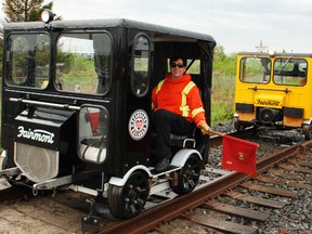 Motorcar tourists were all smiles leaving North Bay, Monday, as they embark on a 1,000-kilometre round-trip to Kapuskasing and back using the Ontario Northland Railway line.