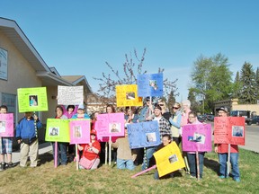 A group of people held a rally outside the ECHO Society building on the morning of Wednesday May, 15 to raise awarness in provincial budget cuts to the Persons with Developmental Disabilities (PDD) program.
Barry Kerton | Whitecourt Star
