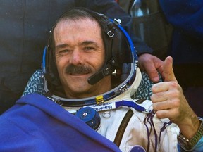 Canadian astronaut Chris Hadfield gestures after the Russian Soyuz space capsule landed central Kazakhstan last week. Hadfield, the first Canadian astronaut to command the International Space Station (ISS) spoke with media over the weekend about his journey and rehabilitation. QMI AGENCY
