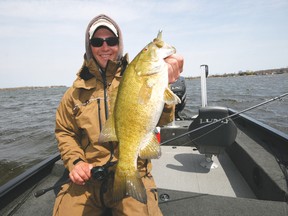 Jeff Gustafson with a big smallmouth from Lake Michigan last week.
HANDOUT PHOTO/JEFF GUSTAFSON